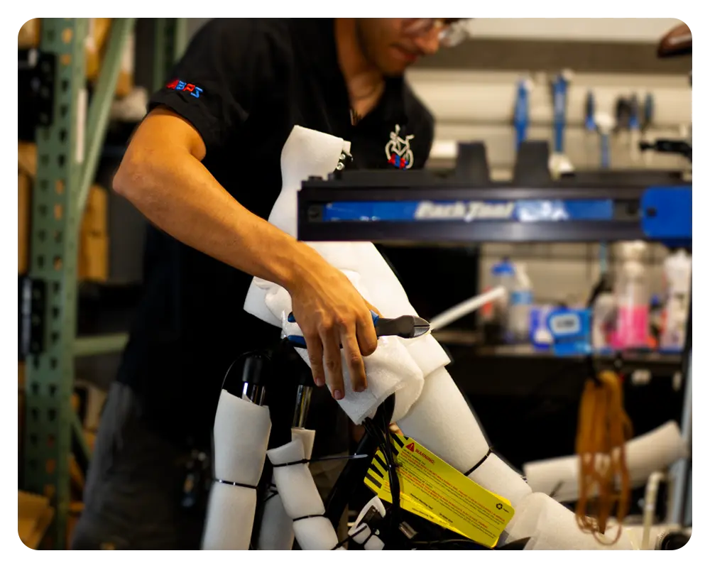 A Mobile Bike Pros Mechanic Unpacking an eBike
